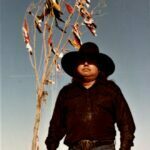 Buddy under the Sun Dance Tree at Chief Fools Crows home.