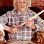 Grandpa blessing a Pipe.