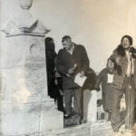 Chief Fools Crow praying at the Wounded Knee burial site.